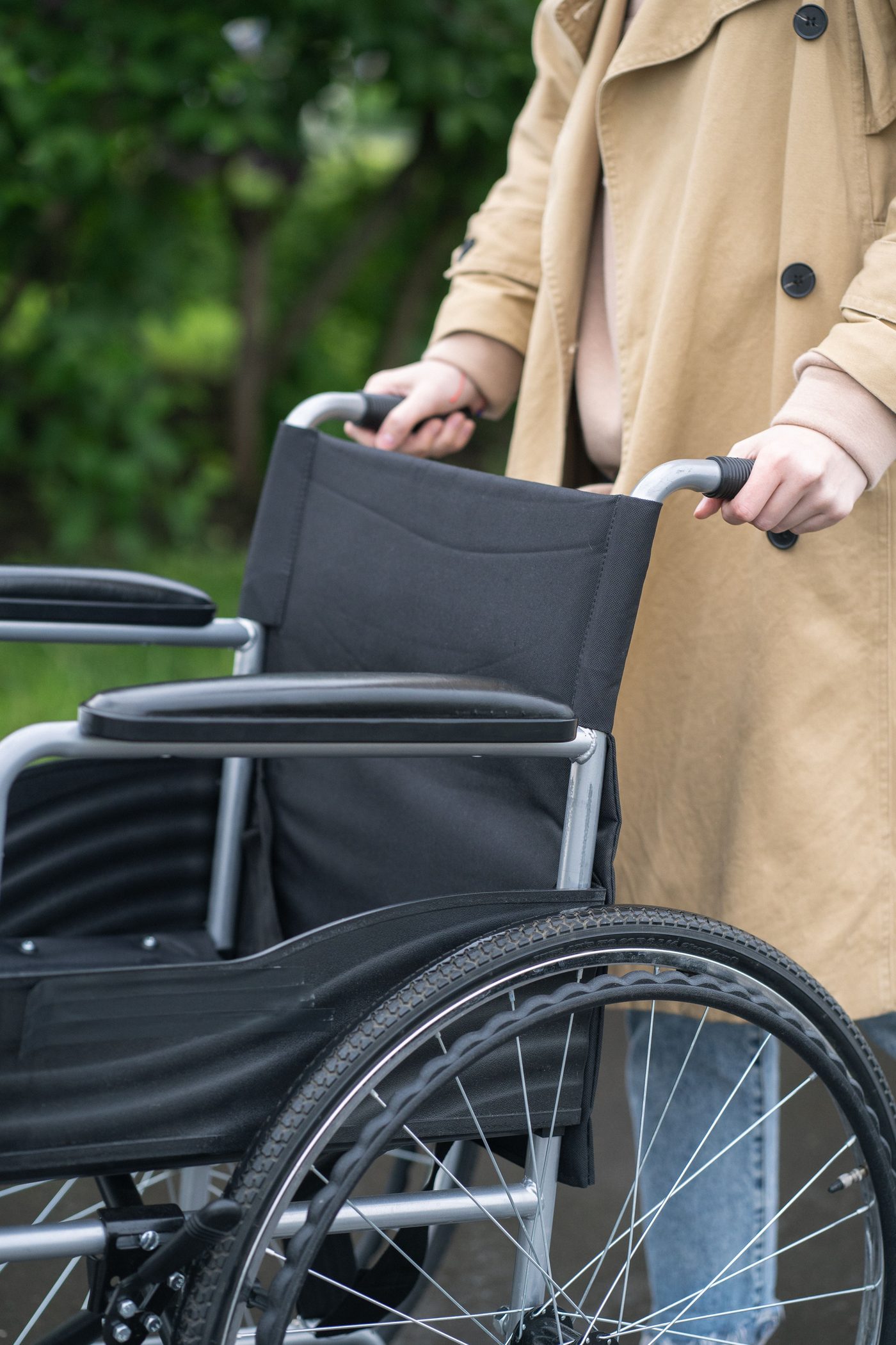Caregiver assisting a client with a wheelchair, home medical care in the Mountain West